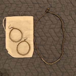 Noonday matching earrings and necklace.